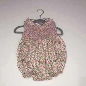 Smockingbird floral onesie